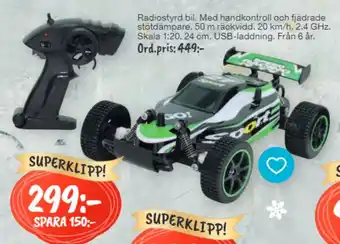 Radiostyrd Bil. Med Handkontroll Och Fjädrade Stötdämpare