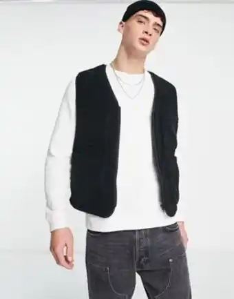 ASOS Asos design – svart väst i teddymaterial erbjuda
