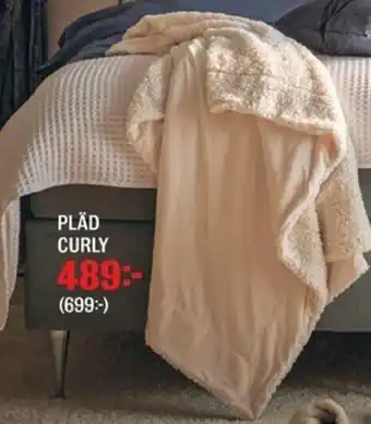 Mio PLÄD CURLY erbjuda
