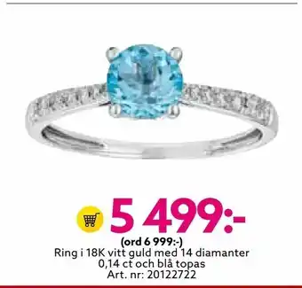 Ring i 18K vitt guld med 14 diamanter 0,14 ct och blå topas