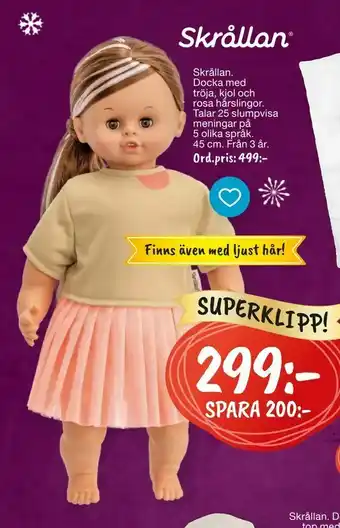 Skrållan Docka med tröja, kjol och rosa hårslingor