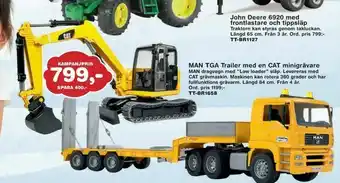 MAN TGA Trailer med en CAT minigrävare