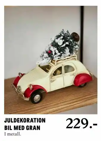Blomsterlandet Juldekoration bil med gran erbjuda