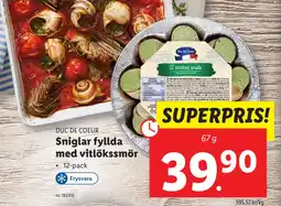 Sniglar fyllda med vitlökssmör