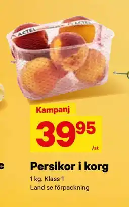 Persikor i korg