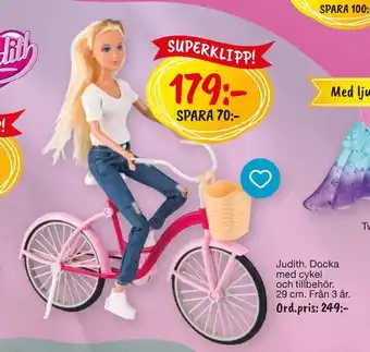 Leklust Judith. Docka med cykel och tillbehör erbjuda