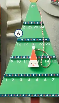 Bed Bath & Beyond H for happy™ christmas countdown tabletop tree figurine in green offer