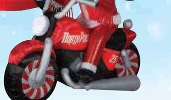Ace Hardware Inlatable santa in racer 4' x 7.5' offer