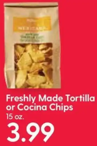 Hy-Vee Freshly Made Tortilla or Cocina Chips 15 oz offer