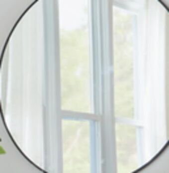 The Home Depot Home decorators collection round accent mirror offer