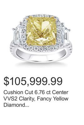 Costco Cushion cut 6.76 ct center vvs2 clarity, fancy yellow diamond platinum halo ring offer