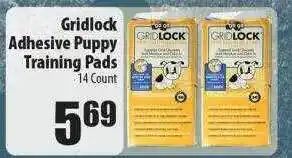 Gridlock adhesive puppy training pads