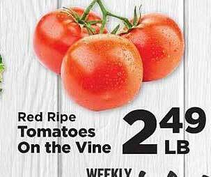 IGA Red ripe tomatoes on the vine offer