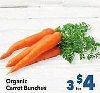 Vallarta Supermarkets Organic carrot bunches offer