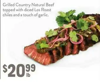 New Seasons Market Grilled Country Natural Beef Topped With Diced Los Roast Chiles And A Touch Of Garlic offer