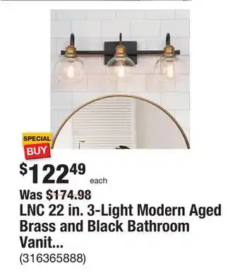 The Home Depot LNC 22 in. 3-Light Modern Aged Brass and Black Bathroom Vanity Light with Clear Glass Globe Shades offer