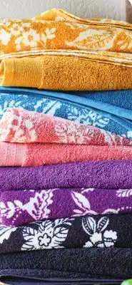 JC Penney Distant Lands Perfect Color or floral bath towel offer