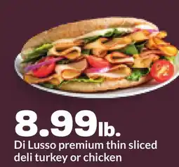 Hy-Vee Di Lusso premium thin sliced deli turkey or chicken offer