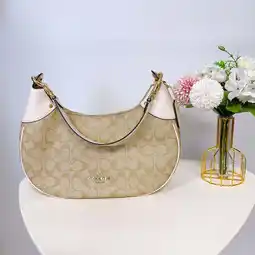 Walmart Coach Women's Leather Signature Canvas Hobo Shoulder Bag, Light Khaki Chalk offer