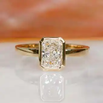 Walmart SOLITAIRE JEWELS 1CT Radiant Bezel E/VS1 Lab Grown Diamond Engagement Ring in 10K Yellow Gold offer