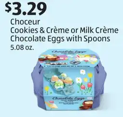 Aldi Choceur Cookies & Crème or Milk Crème Chocolate Eggs with Spoons offer