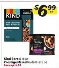 Winn Dixie Kind Bars or Prestige Mixed Nuts offer