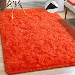 Walmart FUDAKUNA Orange Fluffy Area Rug 48 x 63 Soft and Comfortable Shaggy Carpet Non Slip Backing offer