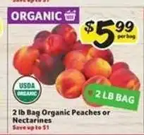 Winn Dixie 2 lb Bag Organic Peaches or Nectarines offer