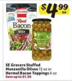 Winn Dixie SE Grocers Stuffed Manzanilla Olives or Hormel Bacon Toppings offer
