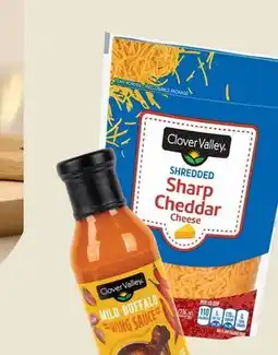 Dollar General Clover Valley Shredded SharpCheddar Cheese, 8 oz or WingSauce Mild Buffalo offer
