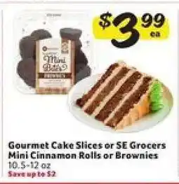Winn Dixie Gourmet Cake Slices or SE Grocers Mini Cinnamon Rolls or Brownies offer