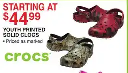 Dunham's Sports CROCS YOUTH PRINTED SOLID CLOGS offer