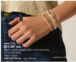 JC Penney Silver or gold-plated cubic zirconia tennis or coil bracelets offer