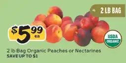 Winn Dixie 2 lb Bag Organic Peaches or Nectarines offer