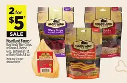 Dollar General Heartland Farms Dog Treats Wavy Strips or Bacon & Cheese offer