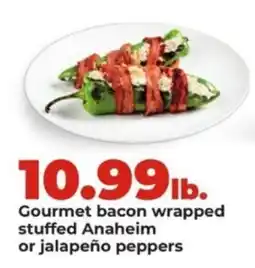 Hy-Vee Gourmet bacon wrapped stuffed Anaheim or jalapeño peppers offer