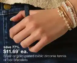 JC Penney Silver or gold-plated cubic zirconia tennis or coil bracelets offer
