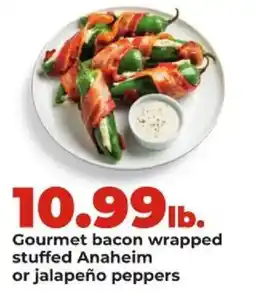 Hy-Vee Gourmet bacon wrapped stuffed Anaheim or jalapeño peppers offer