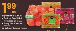 Safeway Signature SELECT Red or Gold Mini Potatoes or Baby Cut Carrots or Yellow Onions offer