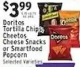 Associated Doritos Tortilla Chips, Cheetos Cheese Snacks or Smartfood Popcorn offer