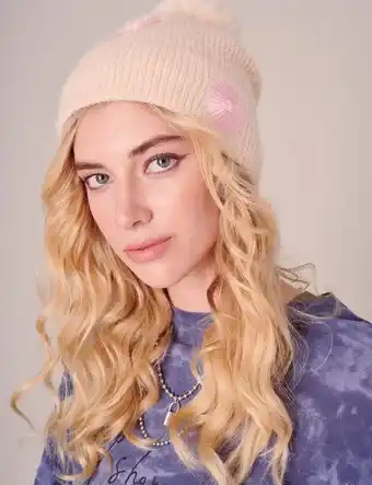 Stein Mart Daisy flower pom pom beanie offer