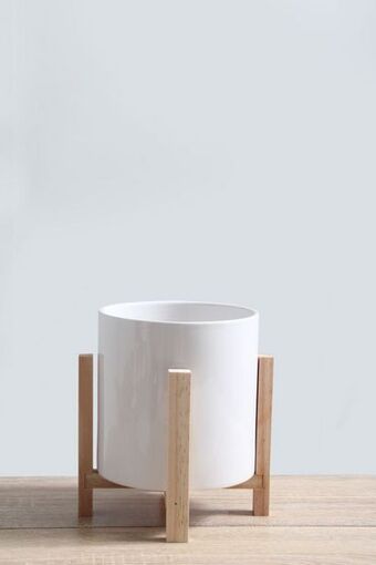 Decorative planter with wooden legs