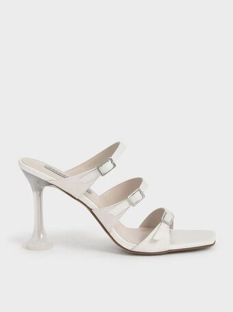 Triple strap sculptural heel mules
 - cream