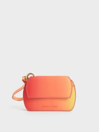 Charles & Keith Selby front flap curved wristlet - sunset offer