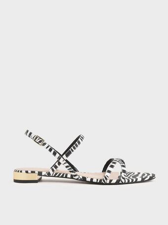 Zebra print strappy flat sandals
- animal print natural