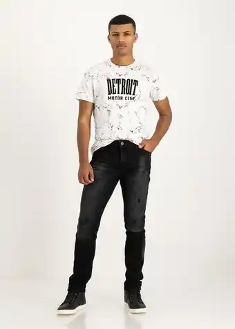 Black abrasion skinny jeans