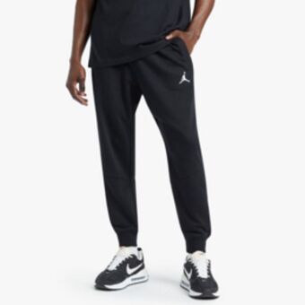 Sportscene Jordan men's dri-fit sport crossover black pants offer
