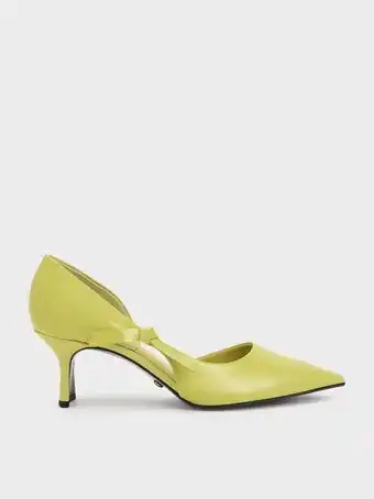 Patent leather bow-tie half d'orsay pumps
 - mustard