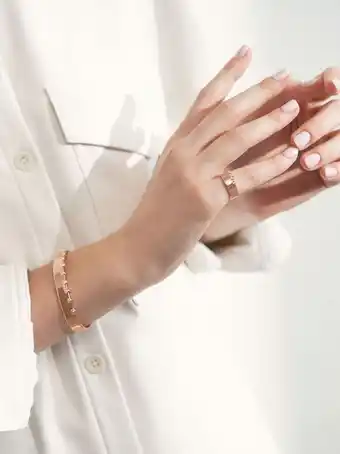 Swarovski® crystal studded ring
 - rose gold