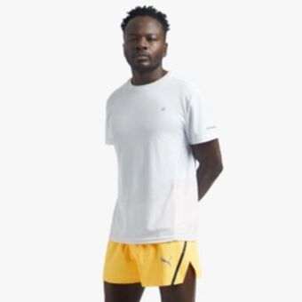 Totalsports Men's puma run split orange shorts offer